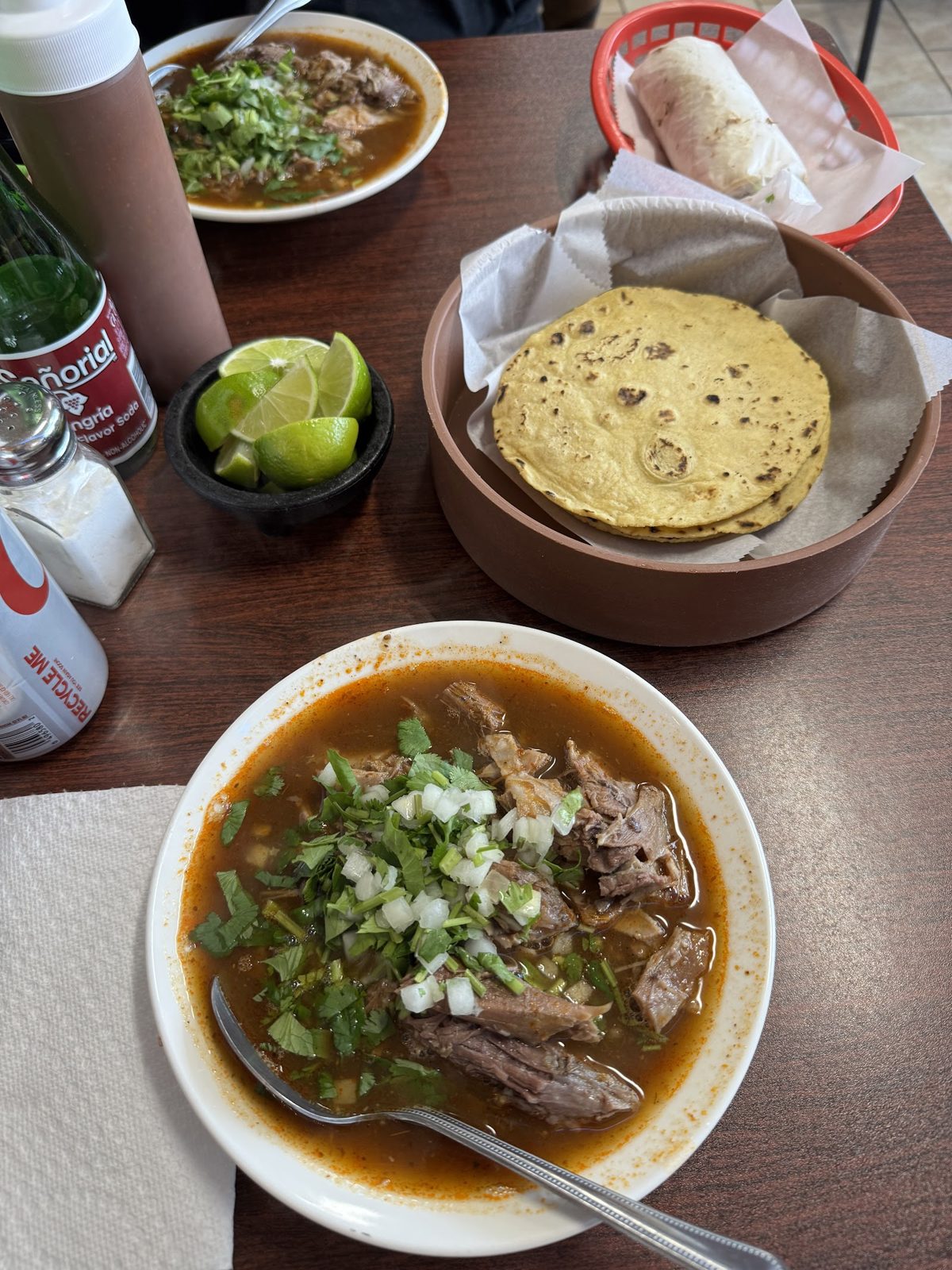 Birria with tortillas and consomé