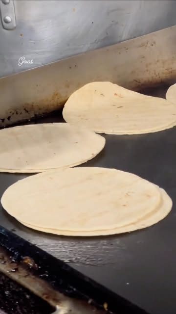 Handmade tortillas on the comal